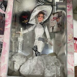 Elegant White and Black Doll with Hat